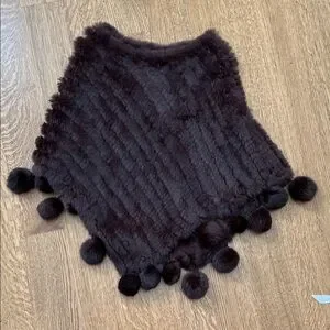 Women’s preowned rabbit poncho.